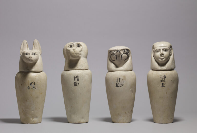 Complete set of four ancient Egyptian canopic jars representing the Four Sons of Horus