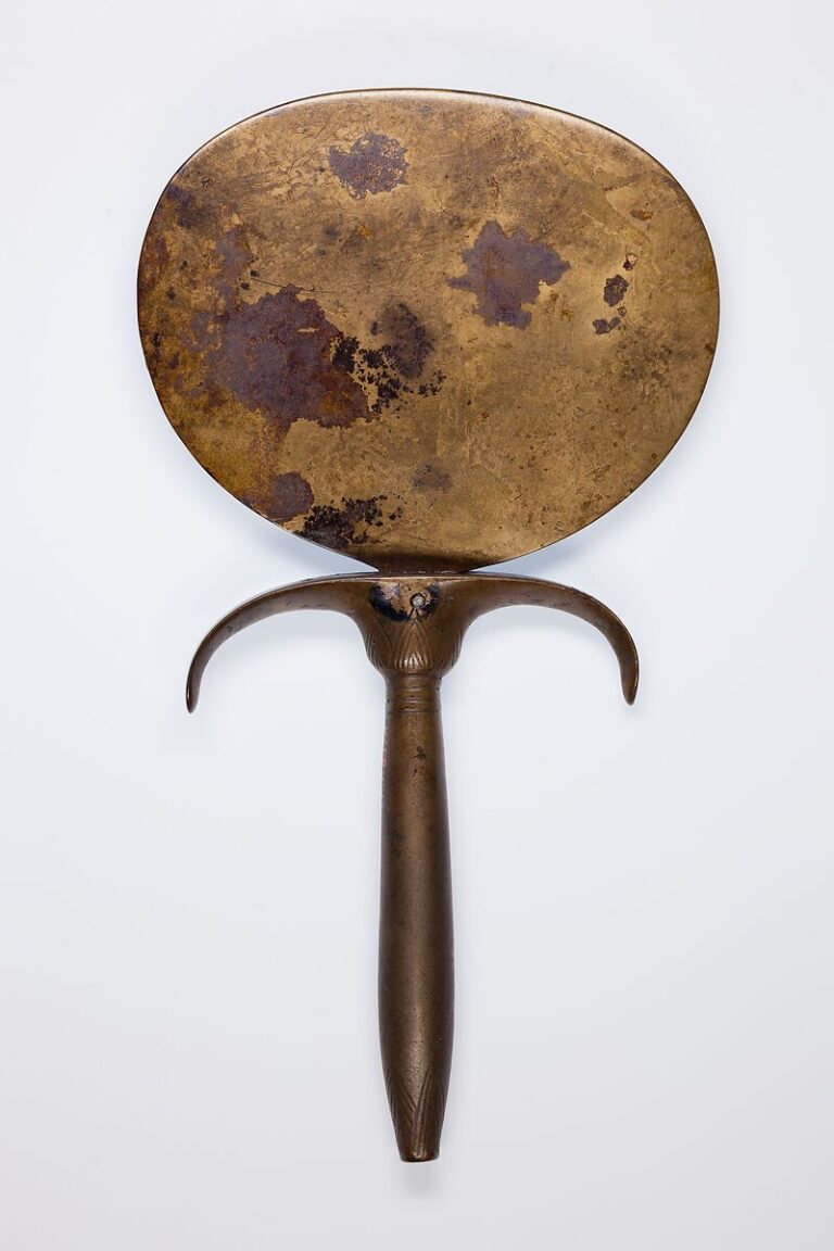 Ancient Egyptian bronze mirror with papyrus-form handle, New Kingdom Dynasty 18, Metropolitan Museum of Art