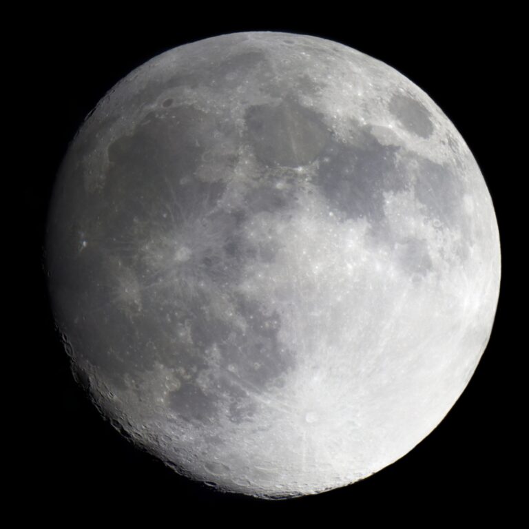 High-resolution full-disk telescopic photograph of the waxing gibbous Moon showing detailed craters, maria, and the terminator.