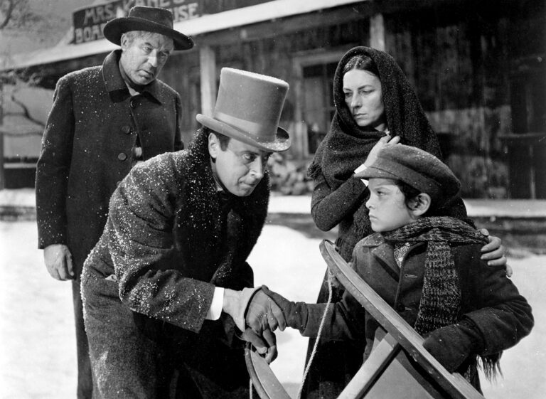 Young Charles Foster Kane holding his sled Rosebud in Citizen Kane.